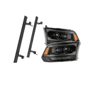 Aftermarket running boards and headlights for a vehicle.