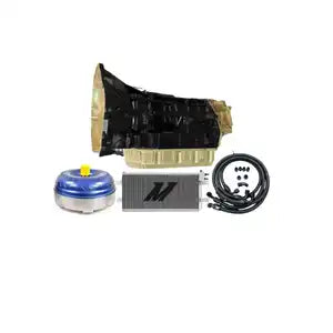Automotive transmission with a torque converter, cooler, and hose kit.