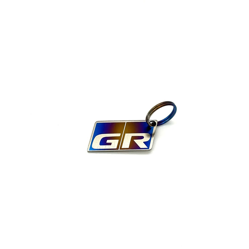 JDC-TI-GRKC-LOGO-BRNT/BARE badge