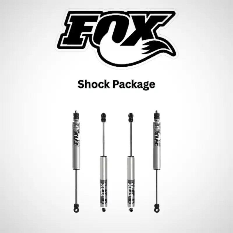 A set of four silver Fox Racing shock absorbers.